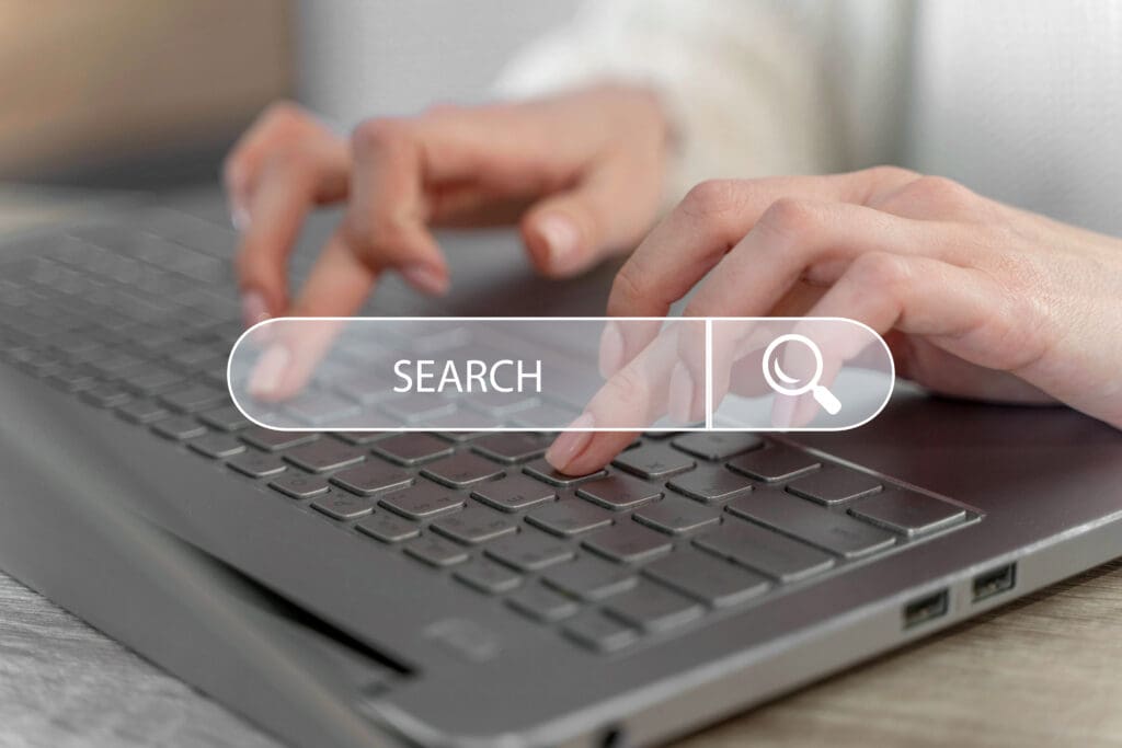 Team member writing blog article to master search intent in 2025: From keywords to Context